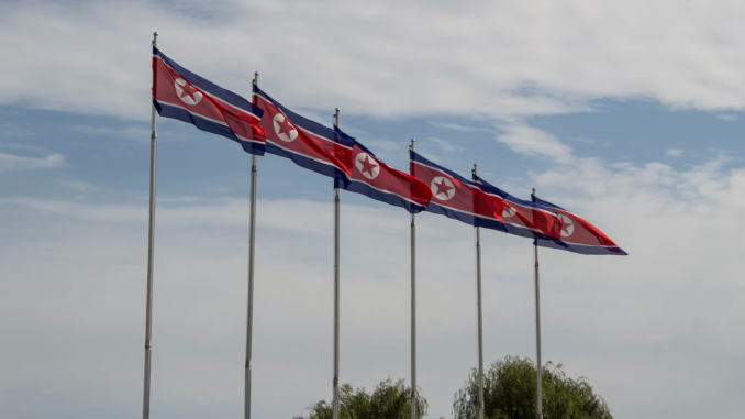 Hack of Japanese Crypto Exchange DMM Pinned on North Korea North Korean flags waving in the wind.