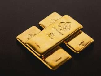 Stacked gold bars (Scottsdale Mint/Unsplash)