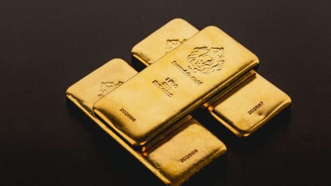 Gold-Backed Crypto Set to Benefit as Wall Street Raises Price Stacked gold bars (Scottsdale Mint/Unsplash)